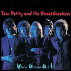 Album cover of You're Gonna Get It! by Tom Petty and the Heartbreakers with band members in purple and blue tones.