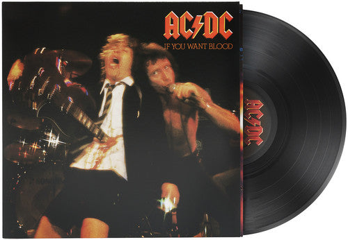 Vinyl record and cover of AC/DC's 'If You Want Blood' with band members on stage.