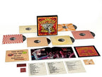 Collection of vinyl records and packaging with colorful design