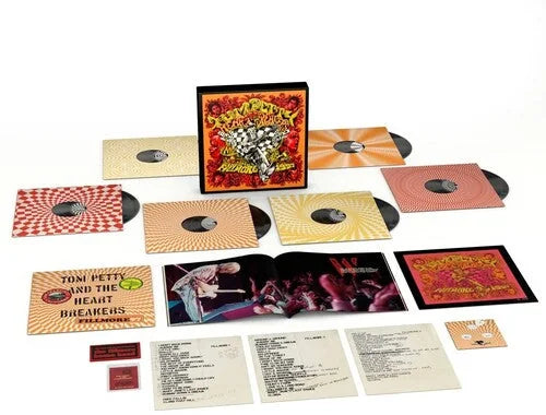 Collection of vinyl records and packaging with colorful design