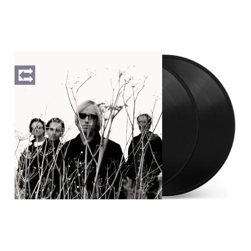 Vinyl record with a black and white album cover